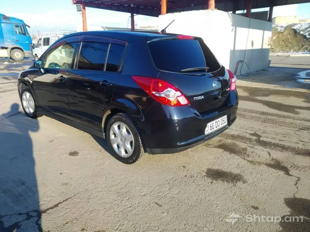 Идеальный Nissan Tiida 2008 года 4