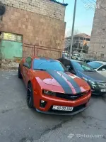 Վաճառվում է Chevrolet Camaro՝ նարնջագույն սև գծերով image thumbnail 0